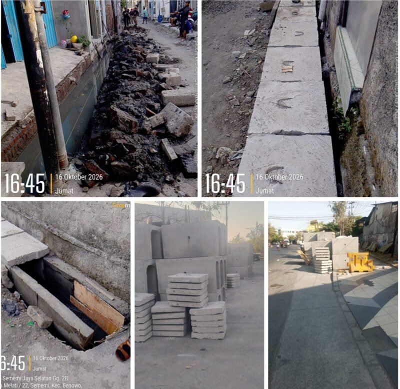 Pekerjaan pemasangan U-ditch berukuran 40 x 60 sentimeter di Jalan Sememi Jaya Selatan Gang 2B, Kelurahan Sememi, Kecamatan Benowo, Surabaya, Jumat (16/10/2026). Dokumentasi menunjukkan saluran masih tergenang, box cover berada di sekitar badan jalan tanpa rambu pengaman, serta belum terlihat papan nama dan pengawas proyek.